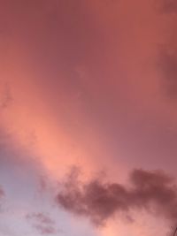 Low angle view of dramatic sky during sunset