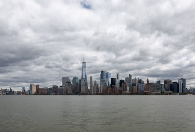 Modern buildings in city against sky