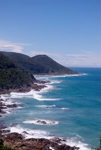 Scenic view of sea against blue sky