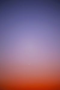 Low angle view of moon against clear sky