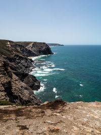 Scenic view of sea against clear sky