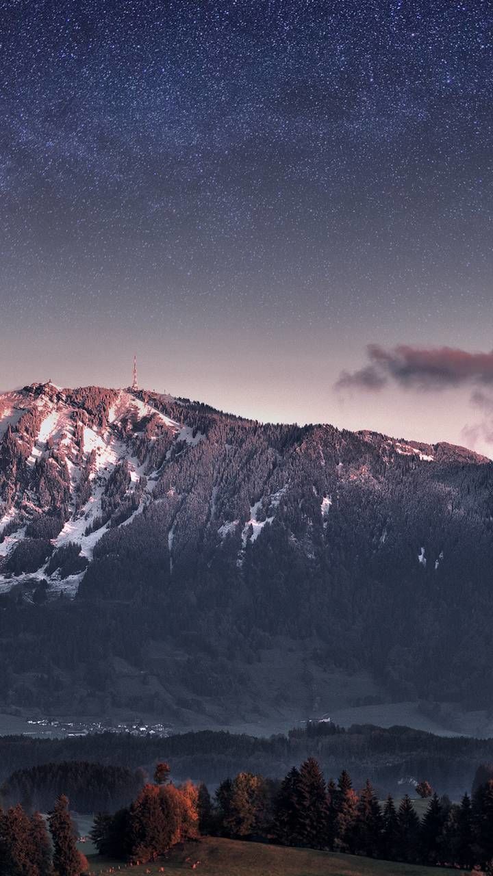 mountain, beauty in nature, nature, scenics, tranquility, tranquil scene, majestic, no people, night, outdoors, sky, snow, mountain range, landscape, astronomy, star - space, cold temperature, moon, winter, constellation, tree, galaxy, milky way, space