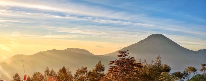 Scenic view of mountains against sky during sunset