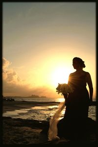 Scenic view of sea at sunset