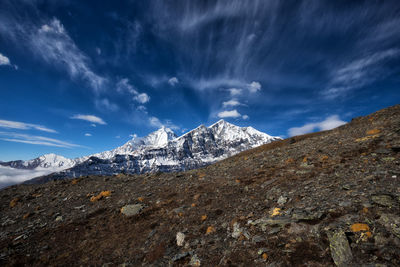 Scenic view of snowcapped mountains against sky