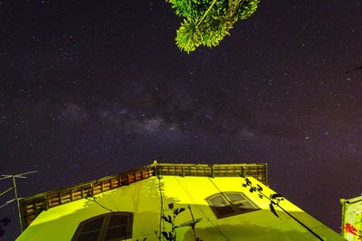 Low angle view of building against sky at night