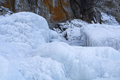 Snow covered rocks in winter