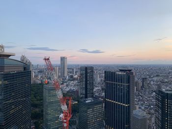 High angle view of buildings against sky during sunset