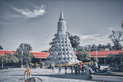 Group of people in temple against building