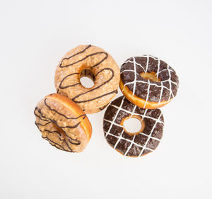 High angle view of bread against white background