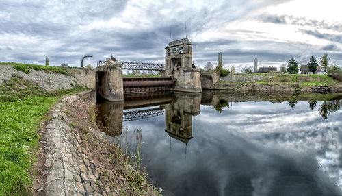 Abandoned old sluice gate. navigable river. water gate