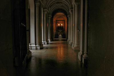 Illuminated corridor of building