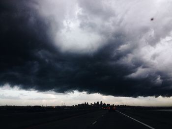 Road against cloudy sky