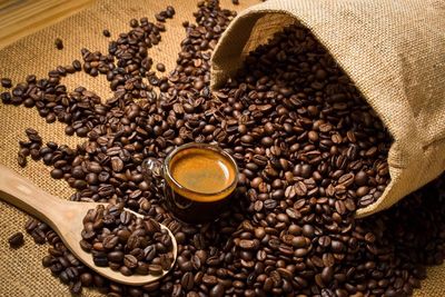 Close-up of roasted coffee beans on burlap