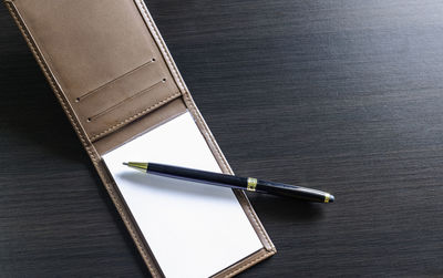 High angle view of pen on table