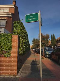 Road sign on street in city