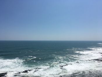 Scenic view of sea against clear sky