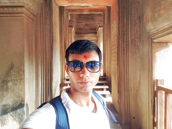 Portrait of young man wearing sunglasses