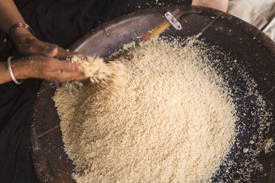 High angle view of person preparing food