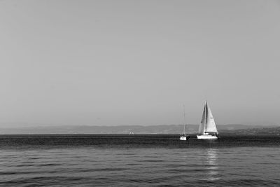 Boats sailing in sea