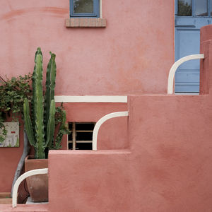 Empty chairs against wall