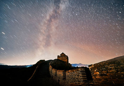 Low angle view of castle at night