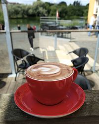 Coffee cup on table at cafe