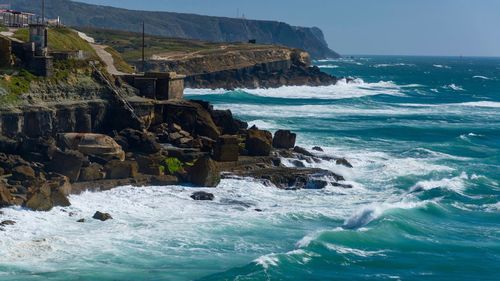 Scenic view of sea against blue sky