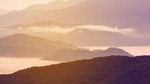 Scenic view of mountains against sky during sunset