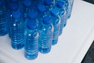 High angle view of bottles on table