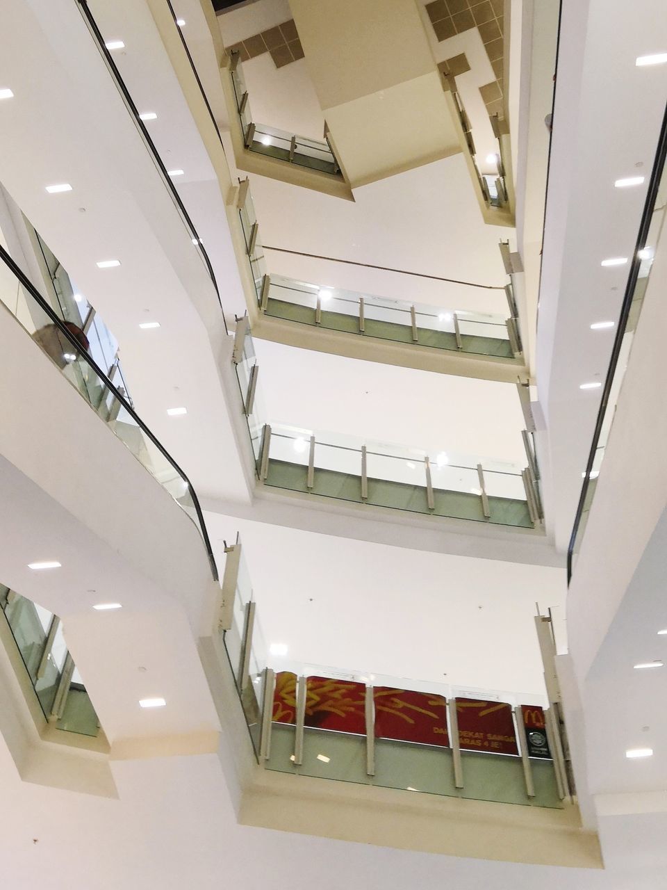 LOW ANGLE VIEW OF ILLUMINATED CEILING