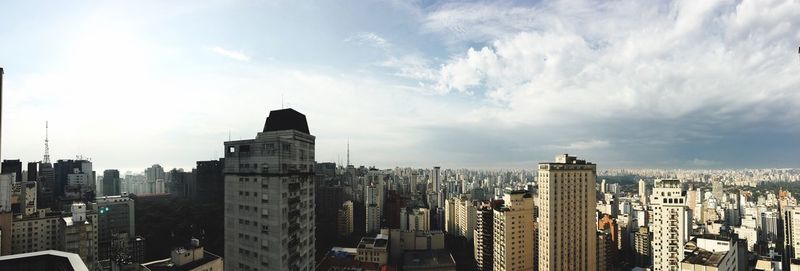 Panoramic view of cityscape against sky