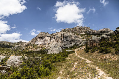 Scenic view of rocky mountains against sky