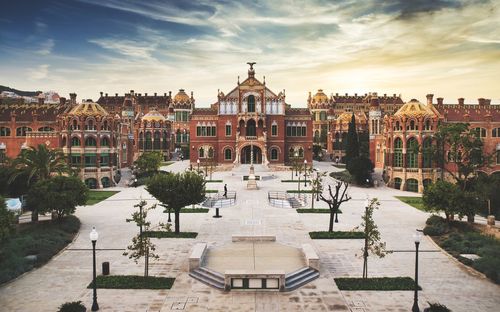 Buildings in city against sky