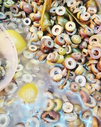 High angle view of olives and lemon