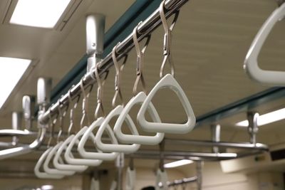 Low angle view of empty seats in rack
