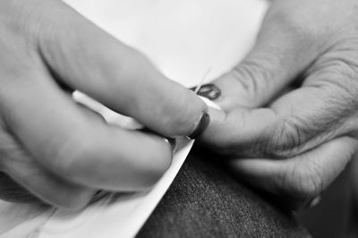 Close-up of woman holding hands