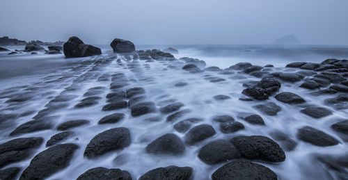 Scenic view of sea against clear sky