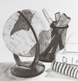 Close-up of sculpture on table against white background