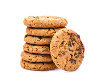 Close-up of cookies against white background