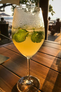 Close-up of beer glass on table at restaurant