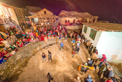 High angle view of people at town square