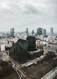 High angle view of buildings in city against sky