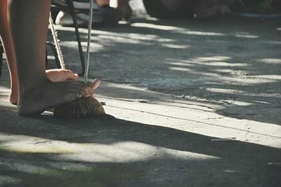 Cropped image of man holding camera