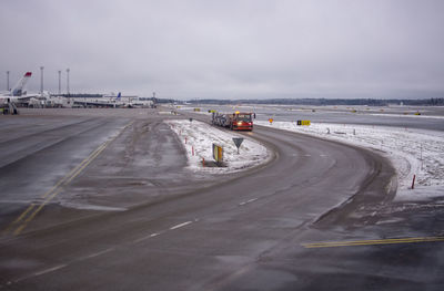 Aerial view of highway against sky