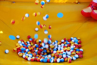 Close-up of bouncing colorful play balls