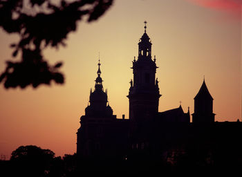 Silhouette of building at sunset