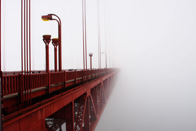 Golden gate bridge against foggy sky