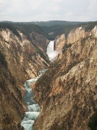 Waterfall and river in a canyon