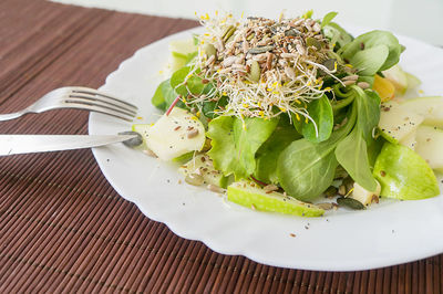 Close-up of salad in plate on table